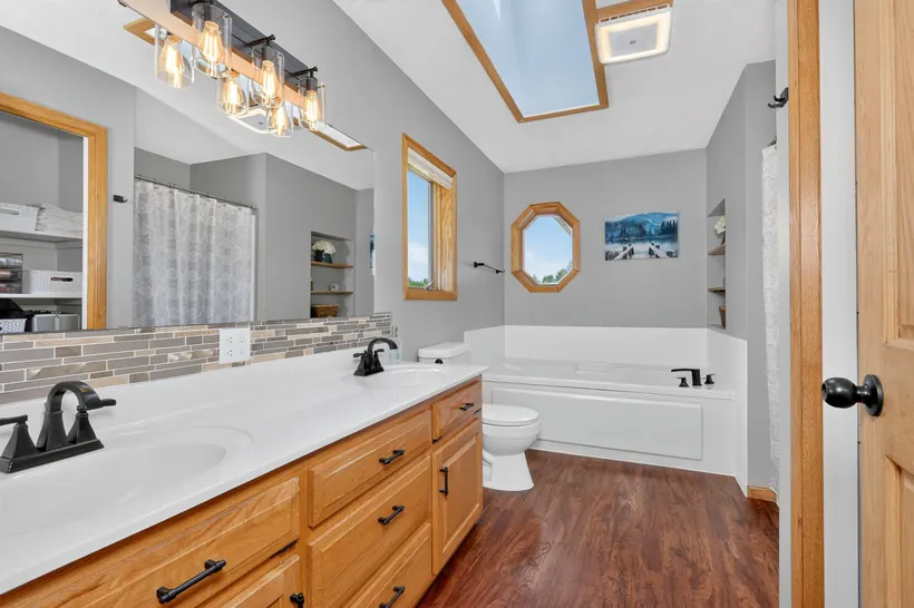Primary bathroom with separate tub and shower