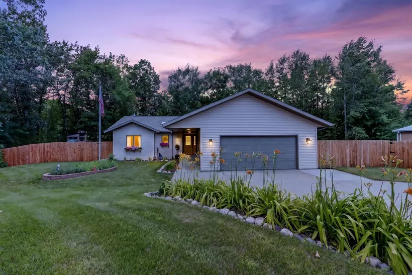 Front exterior of 35695 Brookside Lane at twilight