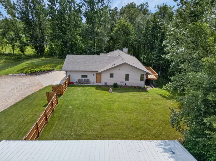 Aerial view of the rear yard and deck