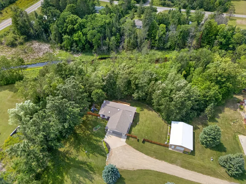 Aerial context showing the property and Bass Brook